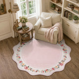 Covaba vintage floral scalloped round rug in blush clay, styled in a room setting, view 4