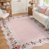 Covaba vintage floral scalloped area rug in blush clay, styled in a room setting, view 3