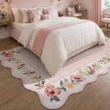 Covaba vintage floral scalloped area rug in blush clay, styled in a room setting, view 4
