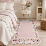 Covaba vintage floral scalloped area rug in blush clay, styled in a room setting, view 7