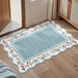 Covaba vintage floral scalloped doormat in dusty blue, styled in a room setting