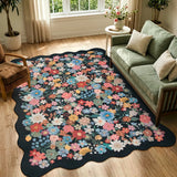 Covaba vintage floral scalloped area rug in ink black, styled in a room setting, view 4