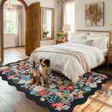 Covaba vintage floral scalloped area rug in ink black, styled in a room setting, view 6