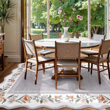 Covaba vintage floral scalloped area rug in muted plum, styled in a room setting, view 4