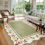 Covaba vintage floral scalloped area rug in willow sage, styled in a room setting, view 6