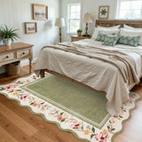 Covaba vintage floral scalloped area rug in willow sage, styled in a room setting, view 7