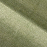 Covaba vintage floral scalloped area rug in willow sage, styled in a room setting, view 9