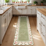 Covaba vintage floral scalloped runner rug in willow sage, styled in a room setting