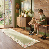 Covaba vintage floral scalloped runner rug in willow sage, styled in a room setting, view 3