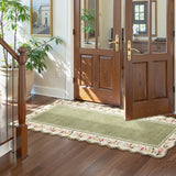 Covaba vintage floral scalloped runner rug in willow sage, styled in a room setting, view 5