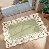 Covaba vintage floral scalloped doormat in willow sage, styled in a room setting
