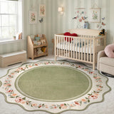 Covaba vintage floral scalloped round rug in willow sage, styled in a room setting, view 5