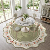 Covaba vintage floral scalloped round rug in willow sage, styled in a room setting, view 6