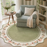 Covaba vintage floral scalloped round rug in willow sage, styled in a room setting, view 7