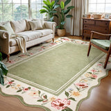 Covaba vintage floral scalloped area rug in willow sage, styled in a room setting, view 2