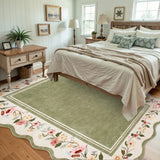 Covaba vintage floral scalloped area rug in willow sage, styled in a room setting, view 3