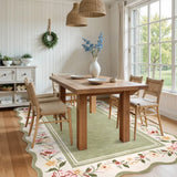 Covaba vintage floral scalloped area rug in willow sage, styled in a room setting, view 4