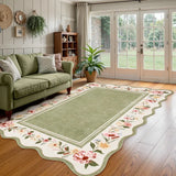 Covaba vintage floral scalloped area rug in willow sage, styled in a room setting, view 5