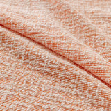 Macro of peach clay chenille fabric showing the flecked woven texture