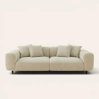 Willow haze chenille stretch cover fitted on a plush three-seat sofa, front view on ivory backdrop