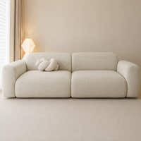 Willow haze chenille sofa cover in a warm minimalist room, styled with a knot cushion by the window