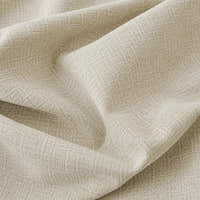 Macro of willow haze chenille fabric in soft folds revealing the woven cross-hatch weave