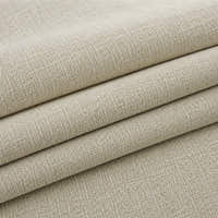 Folded stack of willow haze chenille fabric in close-up, highlighting the woven weave