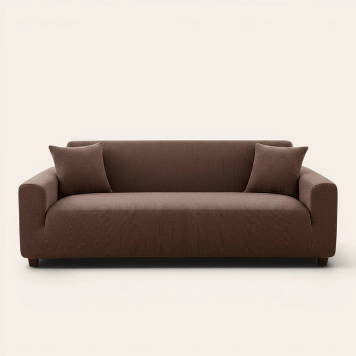 Cocoa brown corduroy stretch sofa cover fitted on a three-seat sofa, front view on ivory backdrop