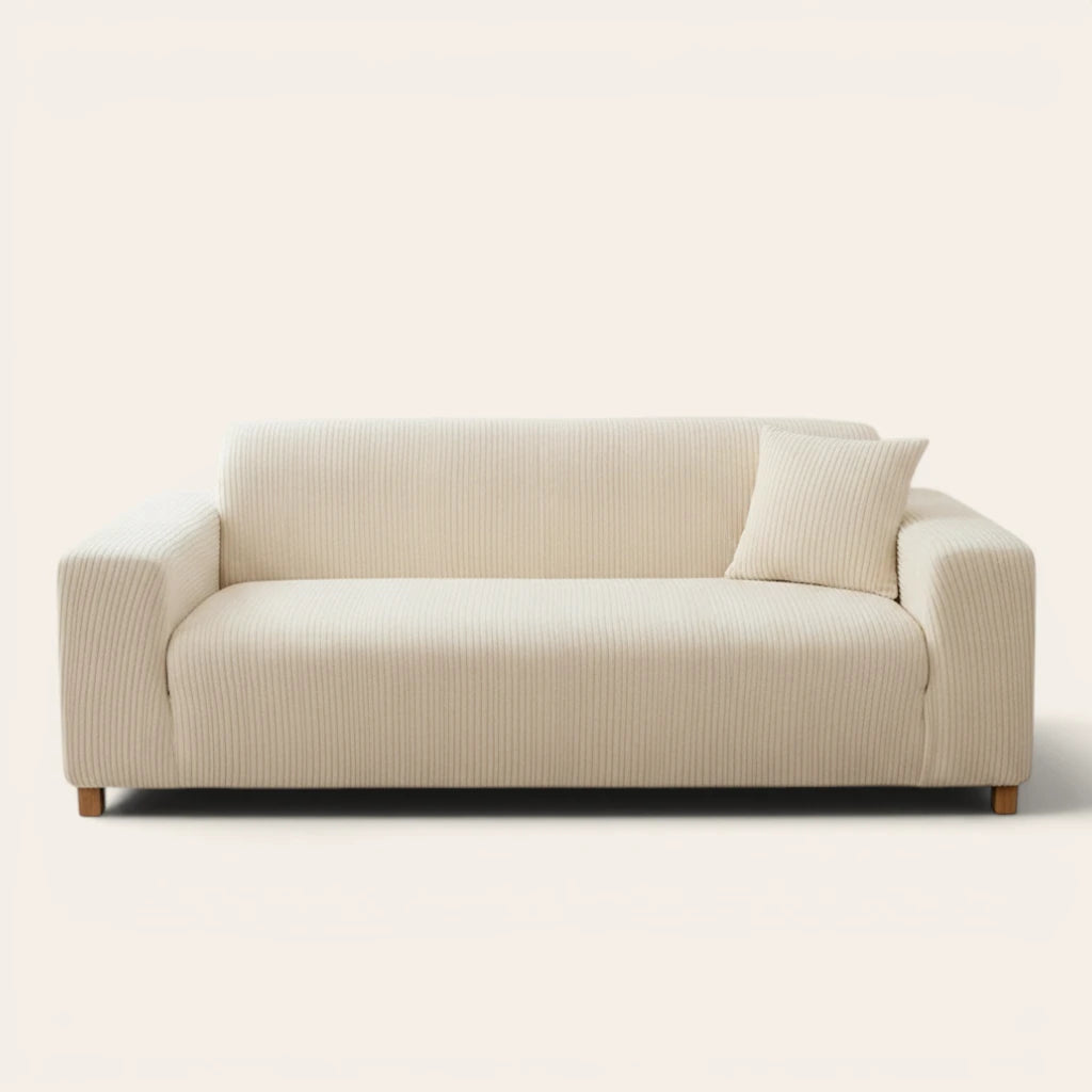 Cream whisper corduroy sofa cover fitted on a three seater sofa, front view on ivory