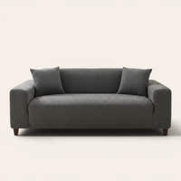 Graphite shadow corduroy sofa cover fitted on a three seater sofa, front view on ivory