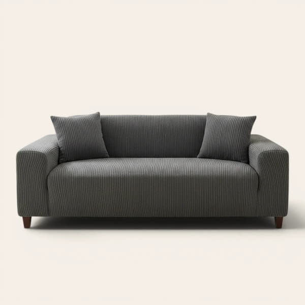 Graphite shadow corduroy sofa cover fitted on a three seater sofa, front view on ivory