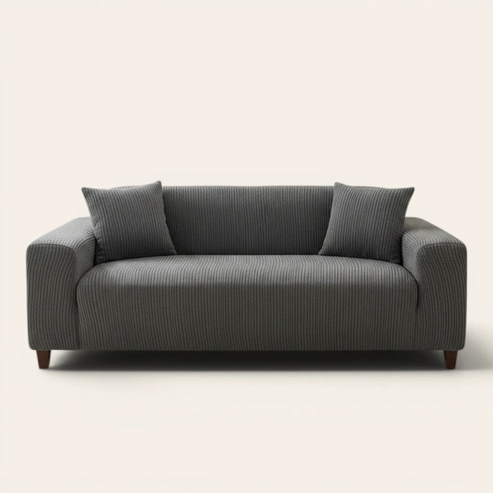 Graphite shadow corduroy sofa cover fitted on a three seater sofa, front view on ivory