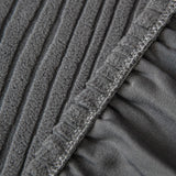 Detail of the overlocked elastic hem edge on the graphite shadow corduroy cover