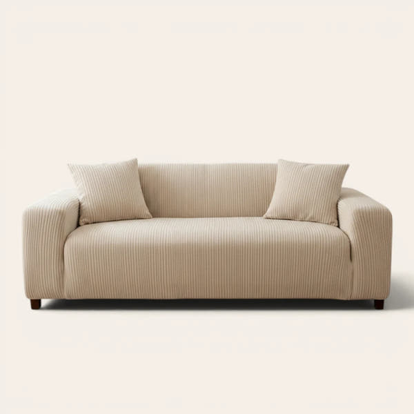 Linen beige corduroy sofa cover fitted on a three seater sofa, front view on ivory
