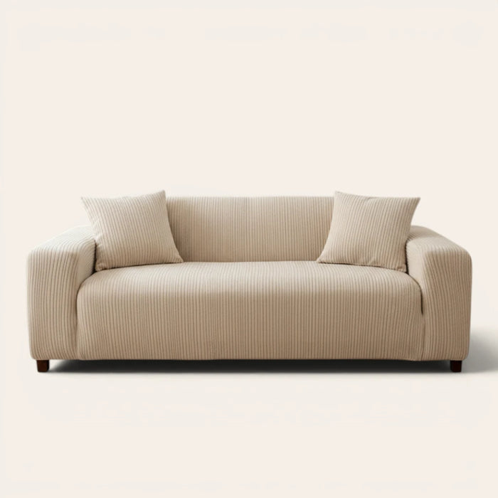 Linen beige corduroy sofa cover fitted on a three seater sofa, front view on ivory
