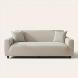 Mist gray corduroy sofa cover fitted on a three seater sofa, front view on ivory