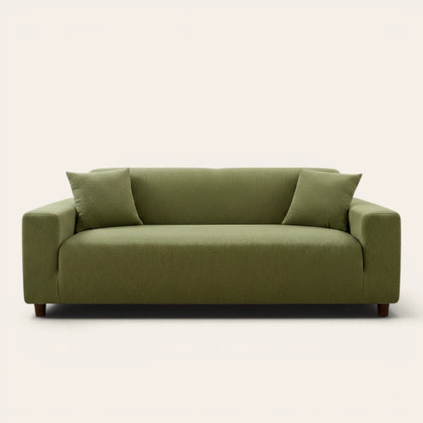 Olive green corduroy sofa cover fitted on a three seater sofa, front view on ivory
