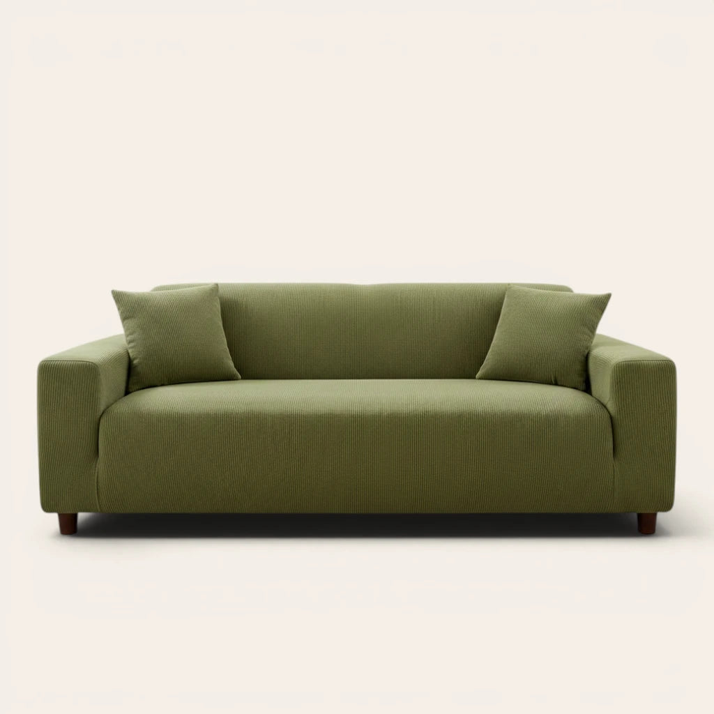 Olive green corduroy sofa cover fitted on a three seater sofa, front view on ivory