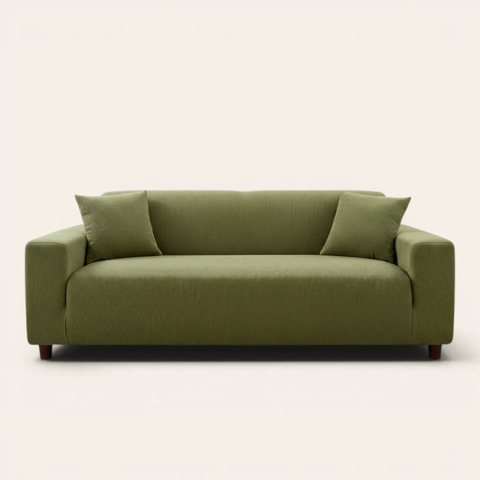 Olive green corduroy sofa cover fitted on a three seater sofa, front view on ivory