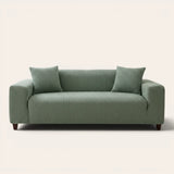 Olive mist corduroy sofa cover fitted on a three seater sofa, front view on ivory