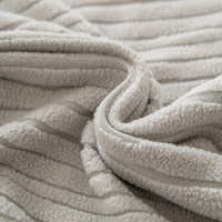 Macro of the Silver Cloud corduroy fabric with gentle folds revealing its plush ribbing