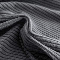 Macro close-up of the Steel Gray corduroy fabric showing its soft wide-wale ribbing