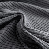 Macro close-up of the Steel Gray corduroy fabric showing its soft wide-wale ribbing