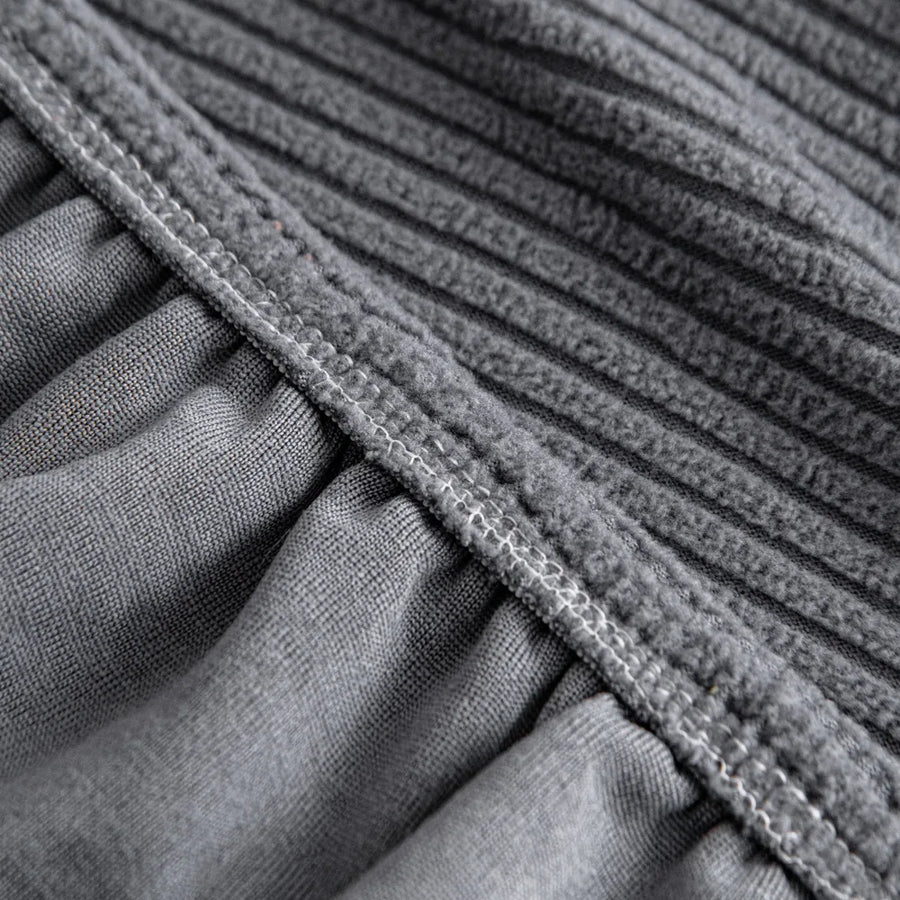 Detail of the Steel Gray corduroy cover elastic hem and stitched stretch edge