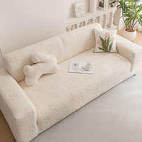 Cream Petal floral sofa cover styled in a bright living room with a tulip accent cushion