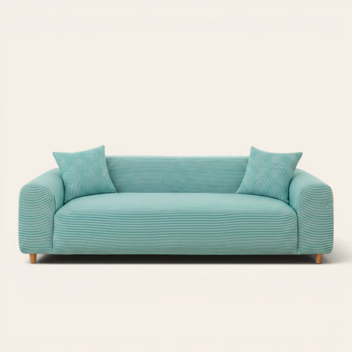 Aqua Mist ice silk sofa cover fitted on a three-seat sofa with matching cushions, front view on ivory