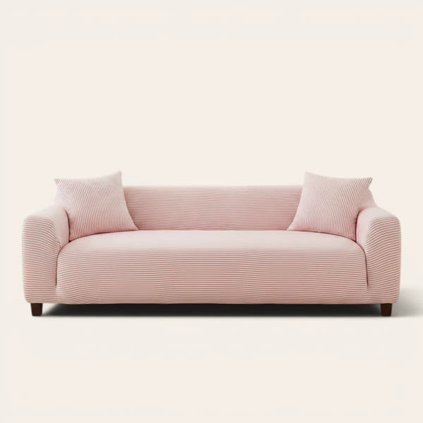 Blush Petal ice silk sofa cover fitted on a three-seat sofa with matching cushions, front view on ivory