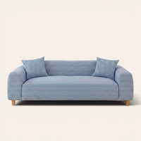 Blue striped ice silk sofa cover on a three-seater, front view on ivory backdrop with matching cushions