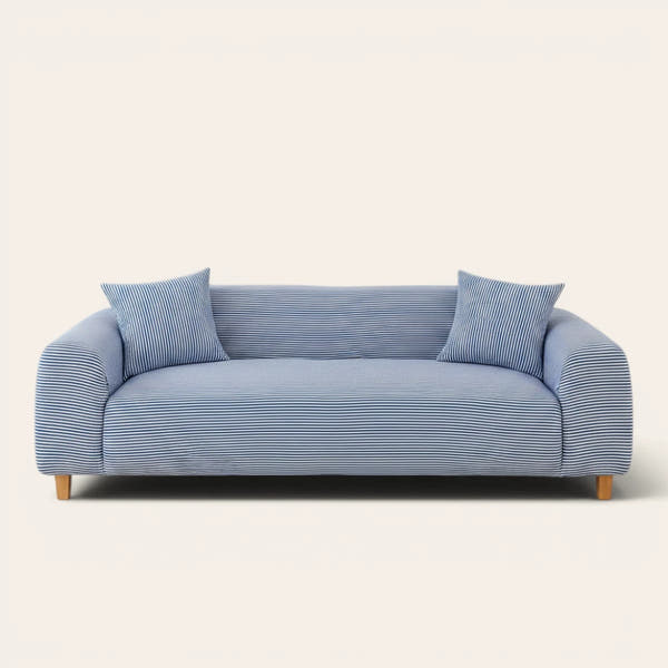 Blue striped ice silk sofa cover on a three-seater, front view on ivory backdrop with matching cushions