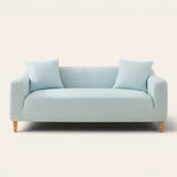 Light blue striped ice silk sofa cover on a three-seater, front view on ivory backdrop with matching cushions